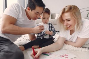 family creating art together at home