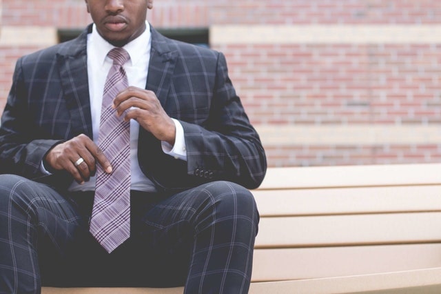 Man in plaid suit