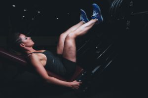 woman on leg press machine